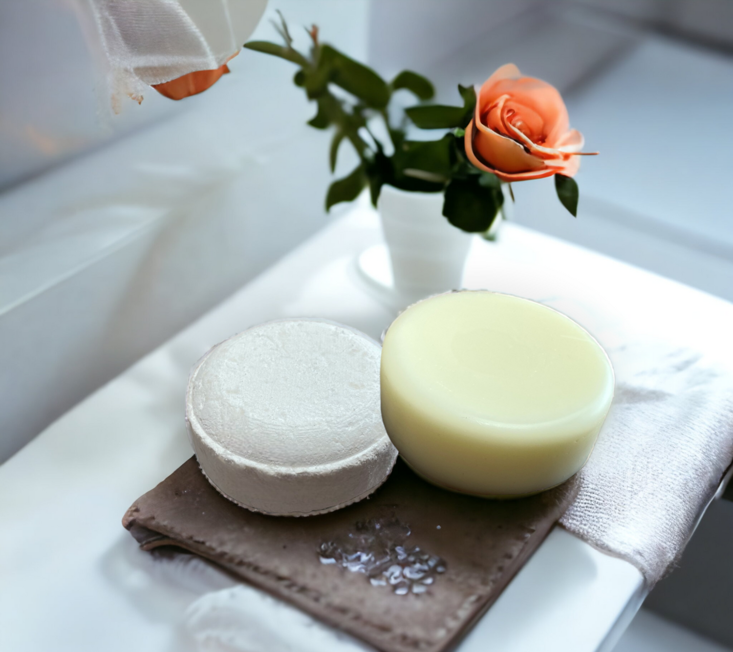 Shampoo bar and conditioner bar, showcasing natural haircare products for gentle cleansing and conditioning.